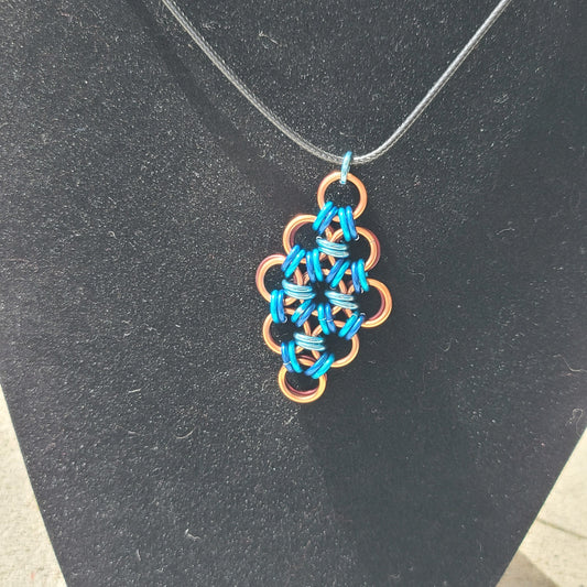 Copper, Bronze, and Shades of Blue Diamond Pendant
