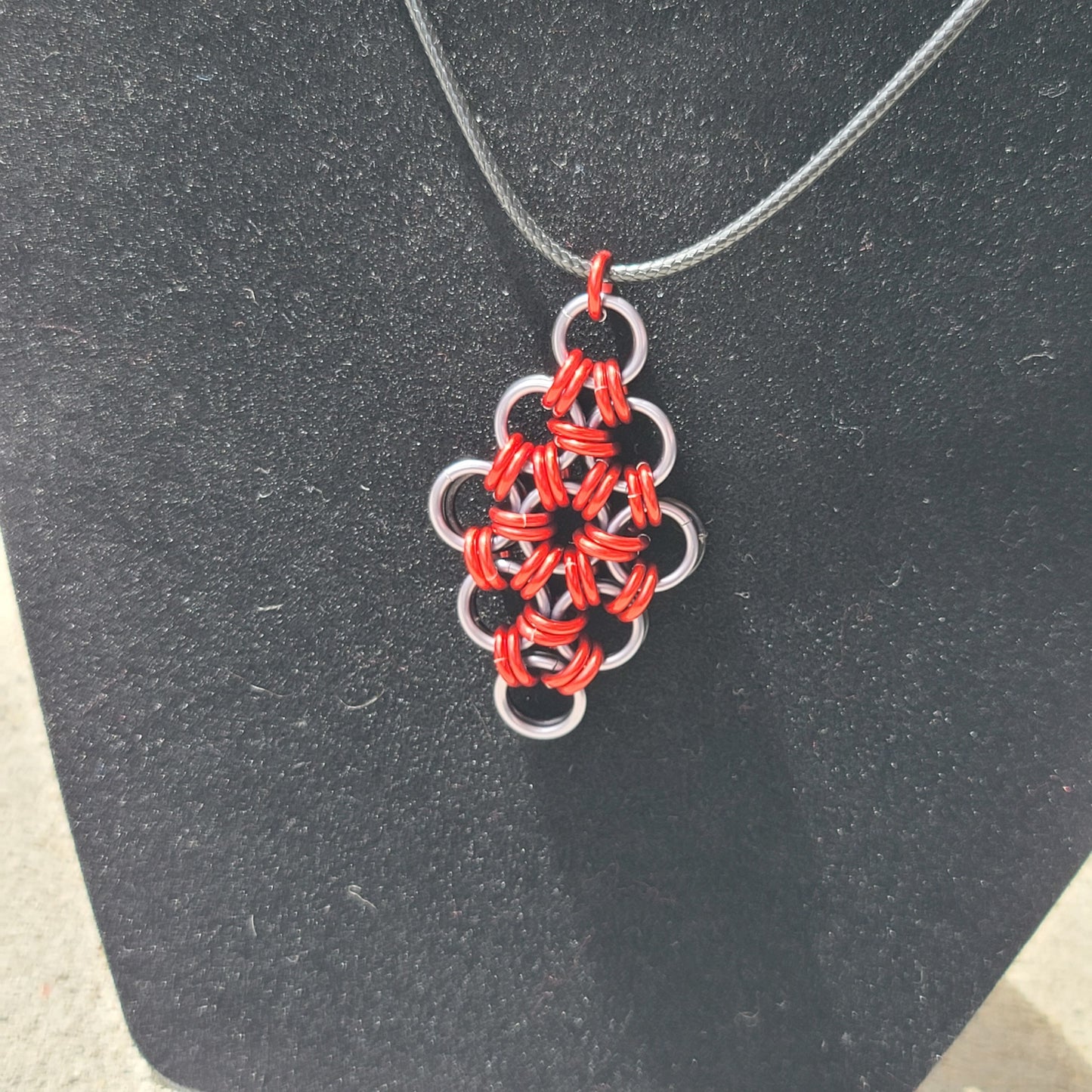 Black, Gunmetal, and Red Diamond Pendant